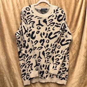 Women’s longsleeved, beige and black, leopard print sweater